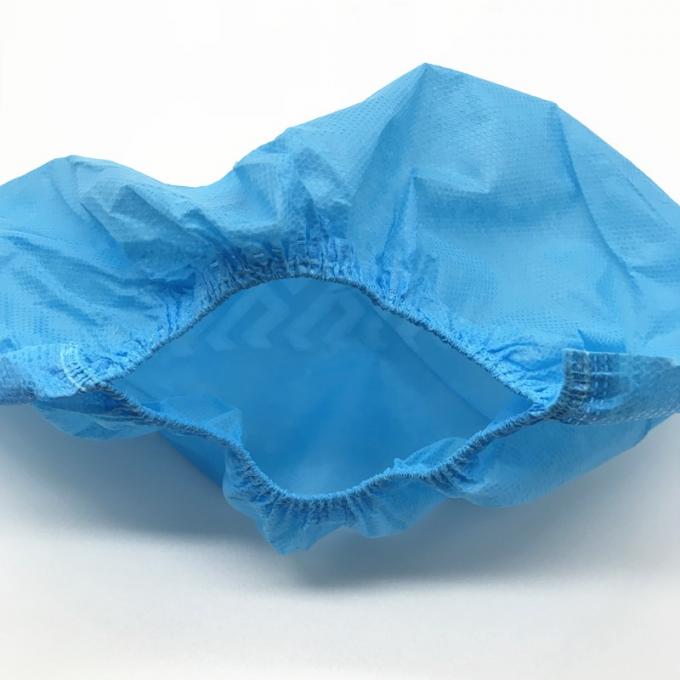No el zapato disponible del resbalón cubre la prueba flúida del PE azul del color automática